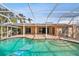 Inviting swimming pool with a fun inflatable raft at 322 Avenida De Paradisio, Sarasota, FL 34242