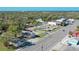 Aerial view of street, buildings, and parking lot at 406 Laurel E Rd, Nokomis, FL 34275