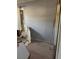 Bedroom under renovation, showing exposed walls and debris at 406 Laurel E Rd, Nokomis, FL 34275