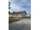 Building exterior showing the rear of the house and some landscaping at 406 Laurel E Rd, Nokomis, FL 34275