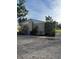 Side view of light tan house at 406 Laurel E Rd, Nokomis, FL 34275