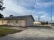Building exterior showing the rear of the house and some landscaping at 406 Laurel E Rd, Nokomis, FL 34275