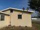 Another side view of the house, highlighting a satellite dish at 406 Laurel E Rd, Nokomis, FL 34275