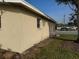Side view of the house with a view of the street at 406 Laurel E Rd, Nokomis, FL 34275