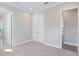 Bright bedroom with neutral decor and access to a bathroom at 616 Mangrove Point Rd, Siesta Key, FL 34242