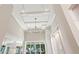 High ceiling with recessed lighting and a modern chandelier at 616 Mangrove Point Rd, Siesta Key, FL 34242