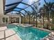 Stunning screened pool and spa with a view at 616 Mangrove Point Rd, Siesta Key, FL 34242