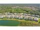 Aerial view of a lakefront community with luxury homes at 7168 Ryedale Ct, Sarasota, FL 34241