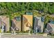 Aerial view of houses with pools and lush landscaping at 7168 Ryedale Ct, Sarasota, FL 34241