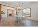 Bright dining room with a table, chairs, and a view of the front yard at 7168 Ryedale Ct, Sarasota, FL 34241