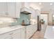 Modern kitchen with stainless steel appliances and light-colored cabinetry at 7168 Ryedale Ct, Sarasota, FL 34241