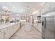 Well-equipped kitchen with island, stainless steel appliances, and white cabinets at 7168 Ryedale Ct, Sarasota, FL 34241