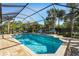 Relaxing screened pool with a spacious patio at 7168 Ryedale Ct, Sarasota, FL 34241