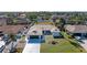 Bird's-eye view of a single-story house with a large backyard and surrounding homes at 9363 Steubenville Ave, Englewood, FL 34224