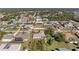Wide aerial view of the property and surrounding homes at 9363 Steubenville Ave, Englewood, FL 34224