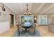 Casual dining area with a round table and chairs, near a window at 9363 Steubenville Ave, Englewood, FL 34224