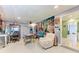 Playful game room with foosball table and a large mural at 9363 Steubenville Ave, Englewood, FL 34224