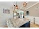 Spacious kitchen with granite countertops, stainless steel appliances, and white cabinets at 9363 Steubenville Ave, Englewood, FL 34224
