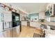 Eat-in kitchen with stainless steel appliances and granite countertops at 9363 Steubenville Ave, Englewood, FL 34224