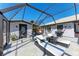 Relaxing patio with covered seating area, perfect for outdoor entertaining at 9363 Steubenville Ave, Englewood, FL 34224