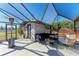 Outdoor patio furniture and a covered sitting area at 9363 Steubenville Ave, Englewood, FL 34224