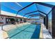 Resort-style screened pool, spacious patio, and backyard at 9363 Steubenville Ave, Englewood, FL 34224
