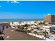 Aerial view of beachside homes and ocean at 1080 W Peppertree Ln # 506A, Sarasota, FL 34242