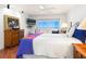 Comfortable bedroom with ocean view and tiled floors at 1080 W Peppertree Ln # 506A, Sarasota, FL 34242