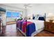 Main bedroom with ocean view and tiled floors at 1080 W Peppertree Ln # 506A, Sarasota, FL 34242