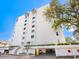 Building exterior with parking and entrance at 1080 W Peppertree Ln # 506A, Sarasota, FL 34242