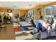 Modern fitness center with cardio and weight equipment at 1080 W Peppertree Ln # 506A, Sarasota, FL 34242