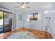 Spacious bonus room with tiled floors and access to patio at 2369 Browning St, Sarasota, FL 34237