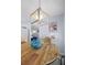 Kitchen dining area with a rustic wooden table at 2369 Browning St, Sarasota, FL 34237