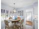 Bright kitchen with white cabinets and a marble countertop at 2369 Browning St, Sarasota, FL 34237