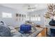 Relaxing living room with a blue color scheme and plenty of natural light at 2369 Browning St, Sarasota, FL 34237