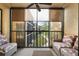 Relaxing balcony overlooking a lush courtyard at 305 30Th W Ave # A208, Bradenton, FL 34205
