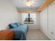 Cozy bedroom with wood floors and plenty of natural light at 305 30Th W Ave # A208, Bradenton, FL 34205