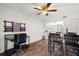 Dining area with dark wood table and chairs at 305 30Th W Ave # A208, Bradenton, FL 34205