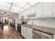 Modern kitchen with ample cabinet space and granite countertops at 305 30Th W Ave # A208, Bradenton, FL 34205