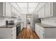 Well-equipped kitchen featuring granite countertops and stainless steel appliances at 305 30Th W Ave # A208, Bradenton, FL 34205