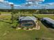 Aerial view showing home, pool, and expansive grounds at 3120 Lena Ln, Sarasota, FL 34240