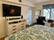 Bedroom with TV, dresser, and home office at 4445 46Th W Ave, Bradenton, FL 34210