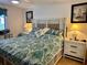 Relaxing bedroom with a comfortable bed and two nightstands at 4445 46Th W Ave, Bradenton, FL 34210