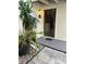 Condo building exterior with walkway and landscaping at 4445 46Th W Ave, Bradenton, FL 34210