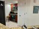 Open kitchen with granite countertops and stainless steel appliances at 4445 46Th W Ave, Bradenton, FL 34210