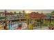 Charming balcony with decorative bistro set and stunning views of the community pool and marina at 505 Tamiami N Trl # 201, Venice, FL 34285