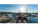 Scenic marina view showcases a beautiful collection of boats docked in the glistening water, a boater's paradise at 505 Tamiami N Trl # 201, Venice, FL 34285