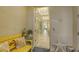Cozy entryway with stylish decor, a decorative bench, and a peek into the beautifully tiled hallway at 505 Tamiami N Trl # 201, Venice, FL 34285