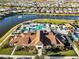 Aerial view of the community clubhouse, swimming pool, and surrounding residences at 5050 Surfside Cir, Lakewood Ranch, FL 34211