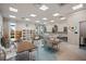 Bright craft room featuring large windows, tables, chairs, and storage at 5050 Surfside Cir, Lakewood Ranch, FL 34211